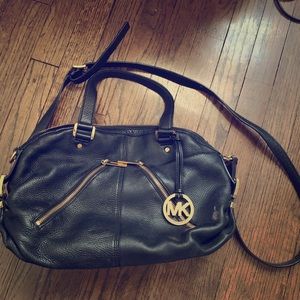 Medium sized Michael Kors black leather satchel